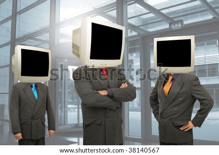 Businessmen with computer screen heads