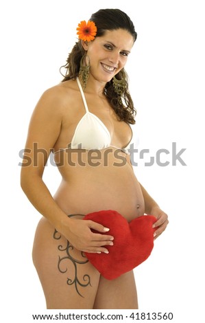stock photo : Pregnant woman with tattoo and red heart isolated in white