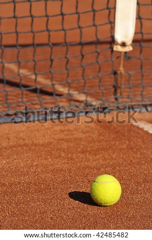 Detail of a clay court with tennis ball
