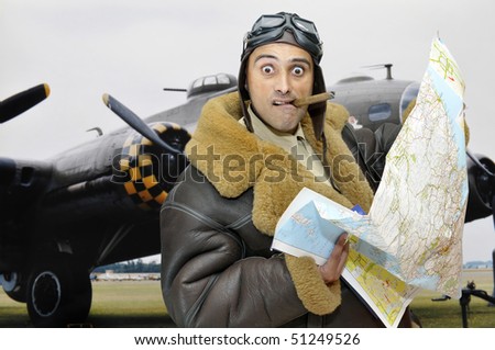 WWII fighter pilot with map and funny face
