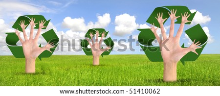 Tree made of hands and recycle symbol over a green field