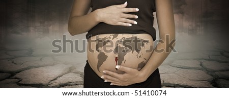 Pregnant woman\'s belly representing the bleeding planet in a polluted environment
