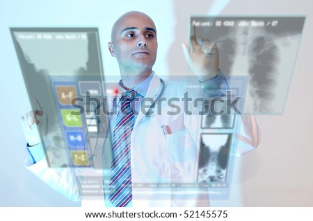 Investigator with high-tech screens in his lab