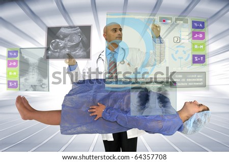 Pregnant woman and doctor with digital screen