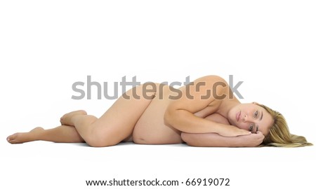 stock photo Beautiful pregnant naked woman posing laying down