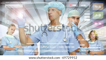 Doctors team in medical facilities with modern screen