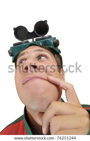 Young construction worker thinking  isolated in white