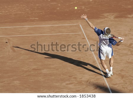 Tennis man in action serving the ball I