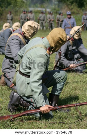 Soldiers with gas mask in battle demonstrative show from first world war