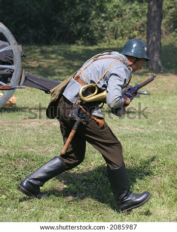 Soldiers in attack position in battle demonstrative show from first world war