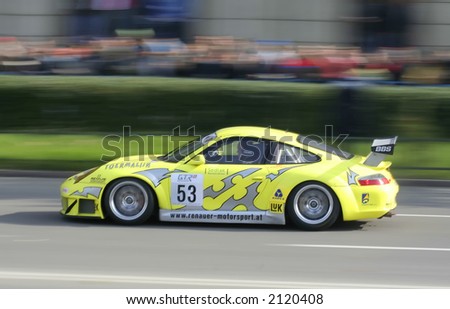 Yellow Race car at a demonstrative show in Bucharest Ring Tour