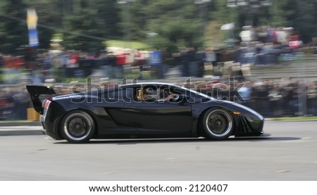 Black race car at a demonstrative show in Bucharest Ring Tour