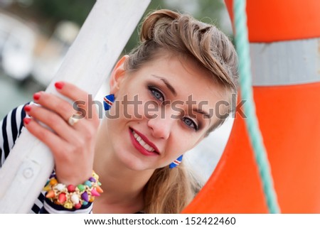girl looks at the rescue station through a lifeline