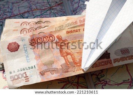 Paper plane and Russian Ruble on the map