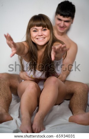 Man and woman in bed.