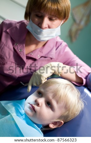 Pediatric Dentistry. A child at a reception at the dentist