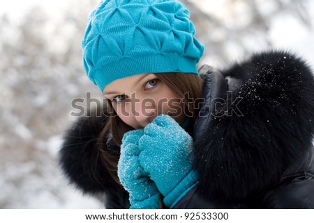 young girl warms frozen hands your breath