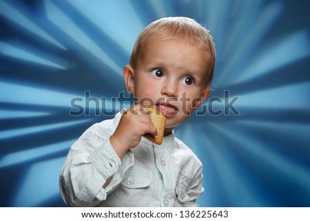 little boy eating cookies