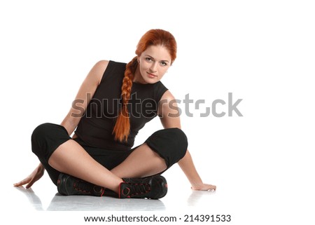 sports girl with an athletic body is engaged in fitness. good health, active movement