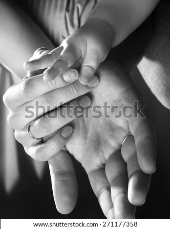 hand the father, mother, child . family values, family, true feelings