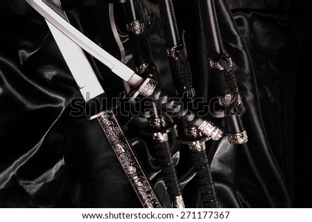 souvenir samurai swords-katana on a black silk