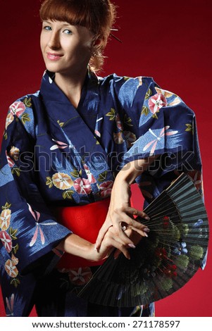 beautiful girl in the Japanese national dress , vivid emotions , kimono, national traditions