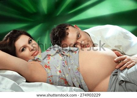 young family waiting for baby, pregnancy. family joy and happiness. love. caring for a baby