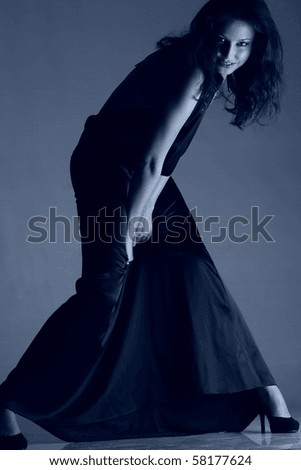 active young girl dances in black white photos