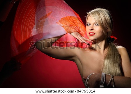 Portrait of young dancing girl with smart fair hair