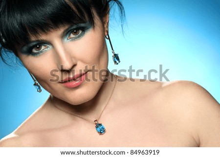 portrait of beautiful girl with the mysterious make-up