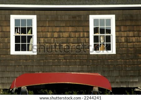 Humorous Building with windows and boat