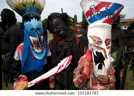LOEI, THAILAND - JULY 1:  People dress in spirit and wear a  mask, show sing and dance is traditional culture in Ghost mask festival (Phi Ta Khon Festival) on July 1,2011 in Loei, Thailand.