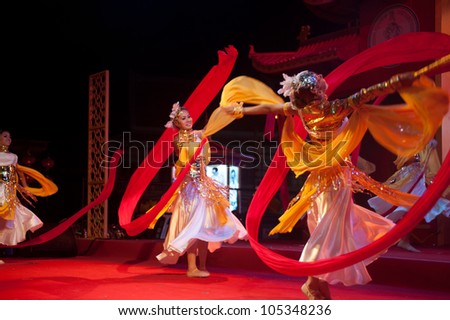 BANGKOK-JANUARY 24: Unidentified people provide music for the modern Dance outside the  Temple during Chinese New Year celebrations on January 24, 2012 in Bangkok,Thailand.