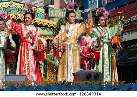 NAKHONSAWAN,THAILAND - FEBRUARY 13: Woman is Fairy performing and dance during the Chinese New Year Parade in Nakhonsawan on February 13, 2013 in Nakhonsawan Province,Middle of Thailand.
