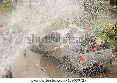 AYUTTAYA, THAILAND - APRIL 15: Songkran Festival is celebrated in a traditional New Year s Day from April 13 to 15, with the splashing water with elephants on April 15, 2013 in Ayuttaya, Thailand