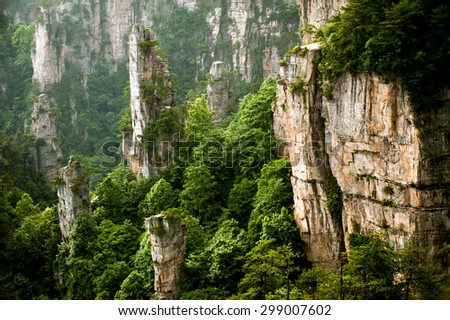 Mysterious mountains in Wulingyuan Scenic area par of Zhangjiajie National Forest Part, Hunan in China.The spot boasts of natural beauty where mountains, valleys, forests, caves, lakes and waterfalls.