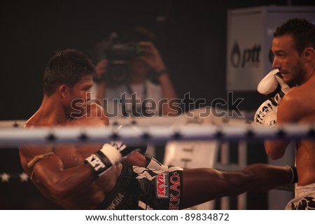 BANGKOK-NOV 27:Unidentified fighters fight Muay Thai at \'Thai Fight Muay Thai...The World\'s Unrivaled fright\' at Imperial Sumrong stadium on November 27,2011 in Bangkok,Thailand.