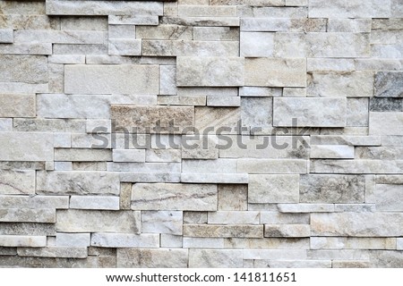 Random rock tiles for decorative finishing in construction work