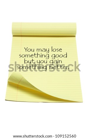 Note Pad with Inspiration Message on White Background