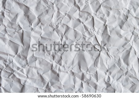 Crinkled sheet of white paper for background