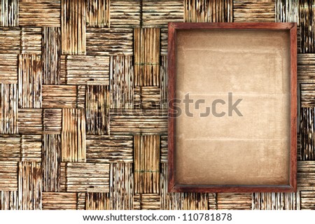 old vintage painting frame on bamboo background