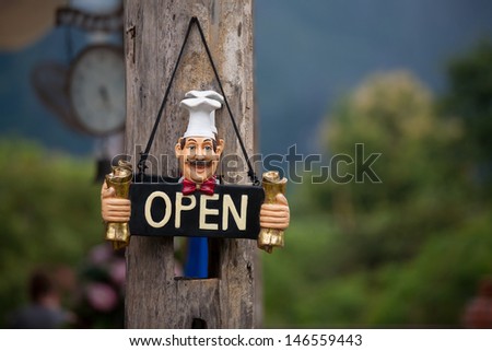 Open restaurant hanging sign