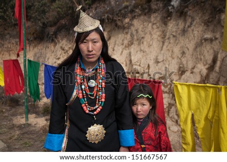 THIMPHU, BHUTAN - DECEMBER 13: Unidentified peoples who dress tradition Bhutan dressing at the tradition mask dance at yearly festival called Tshechu Festival on December 13, 2012 in Bhutan