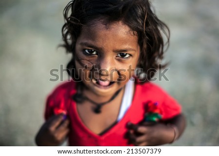 AGRA, INDIA - APRIL 12: Unidentified Indian girl smile and poses for photo shooting on Apr 12, 2014 in Agra, India.