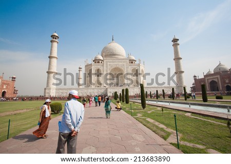 AGRA, INDIA - APRIL 12: Unidentified peoples visit Taj Mahal, 7 Wonder of the world which call \'monument of love\' on Apr 12, 2014 in Agra, India.