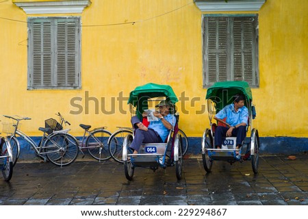 HOI AN, VIETNAM - OCTOBER 21: Unidentified Pedicabs sight seeing city tour for traveller on the street in old town at UNESCO World Heritage on Oct 21, 2014 in Hoi An, Vietnam.