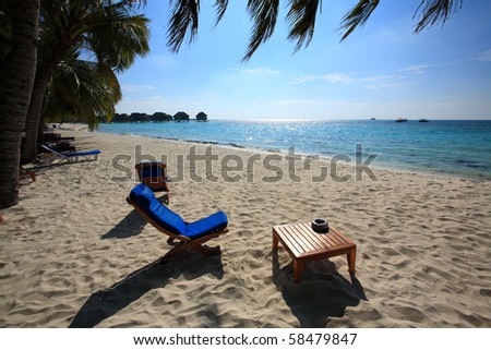 one chair on maldives beach