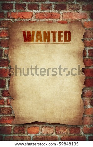 wanted vintage sign on the red brick wall