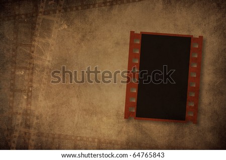 negative film on dark vintage film background with space for your text or image