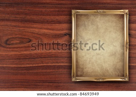 vintage portrait frame on wooden background